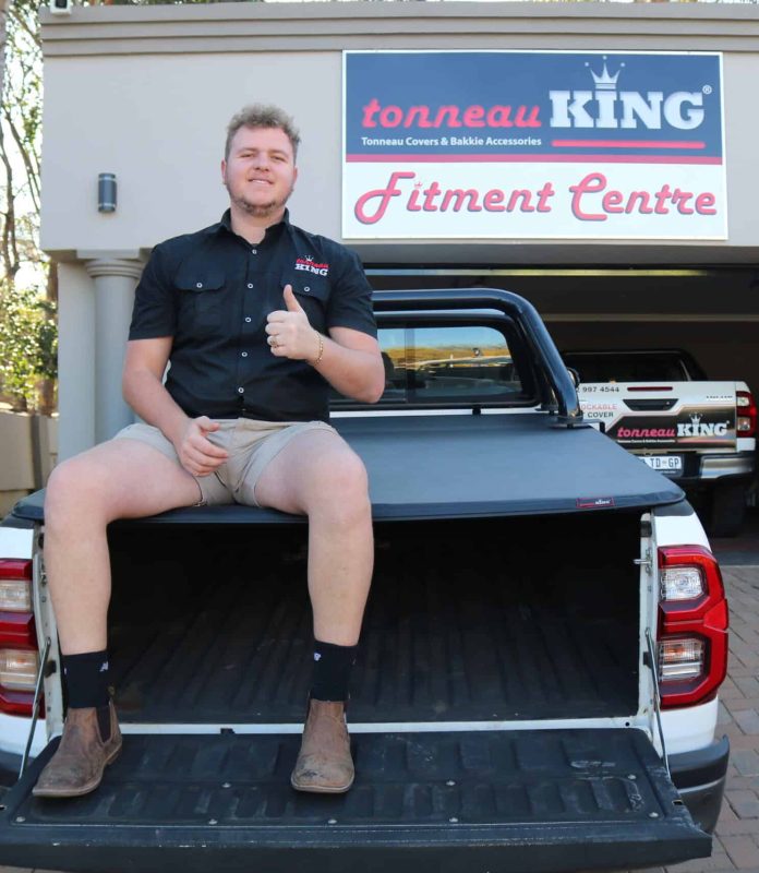 Hard tri fold tonneau cover with secure load bin cover