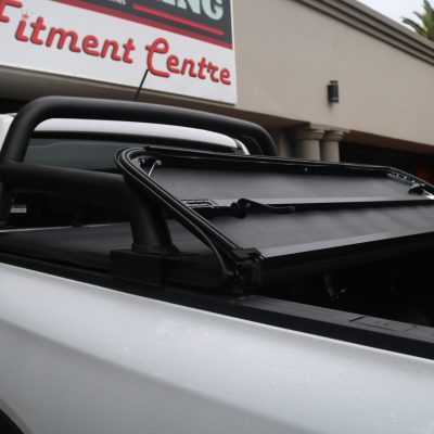 Hard tri fold tonneau cover installed on bakkie load bin