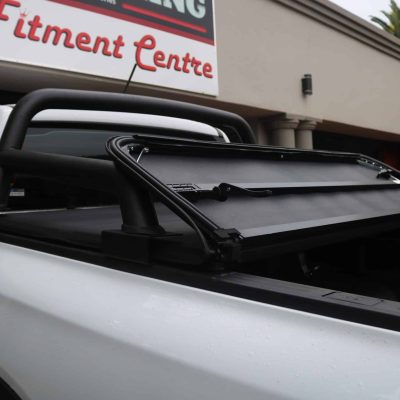 Hard tri fold tonneau cover installed on bakkie load bin