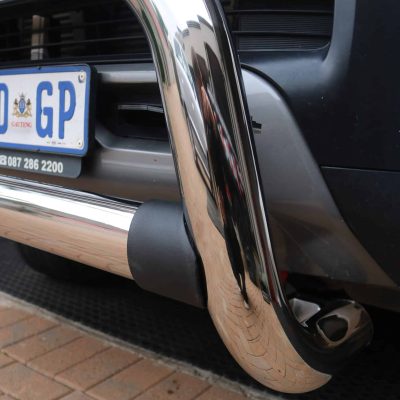 Close up of Tonneau King nudge bar stainless steel finish
