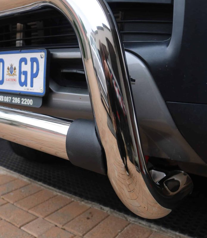 Close up of Tonneau King nudge bar stainless steel finish